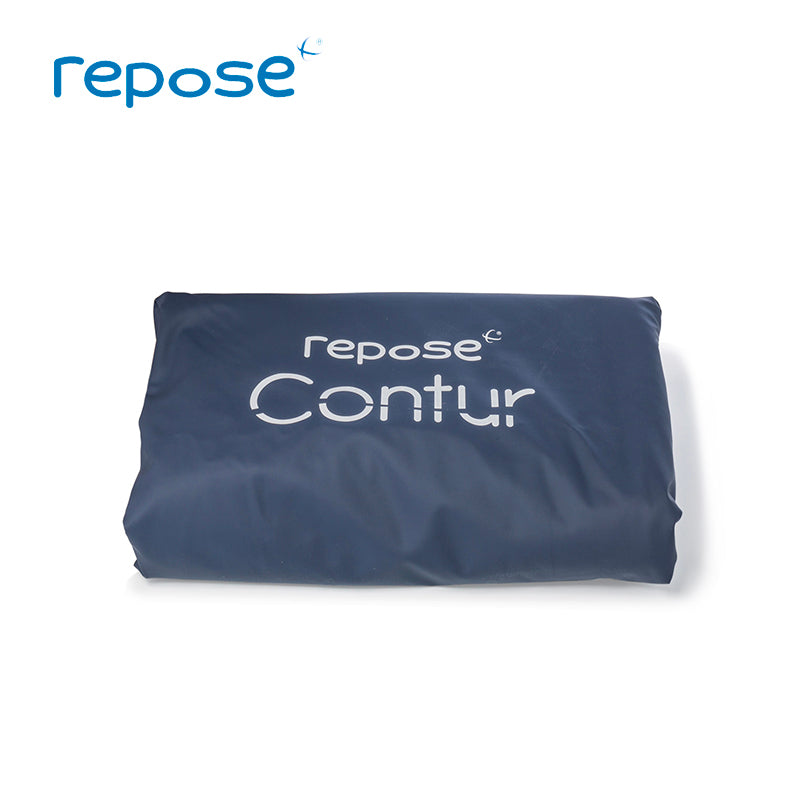 Repose Contur blue cover, folded, showing the brand logo printed on the cover.