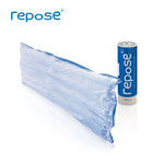 Repose Sole Protector with blue base and clear top,  standing upright on the long edge, with a Repose pump by the side.